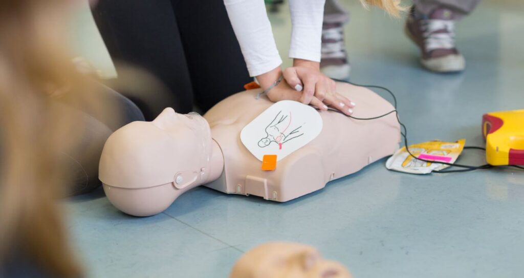 What do you cover on the emergency First Aid Course?